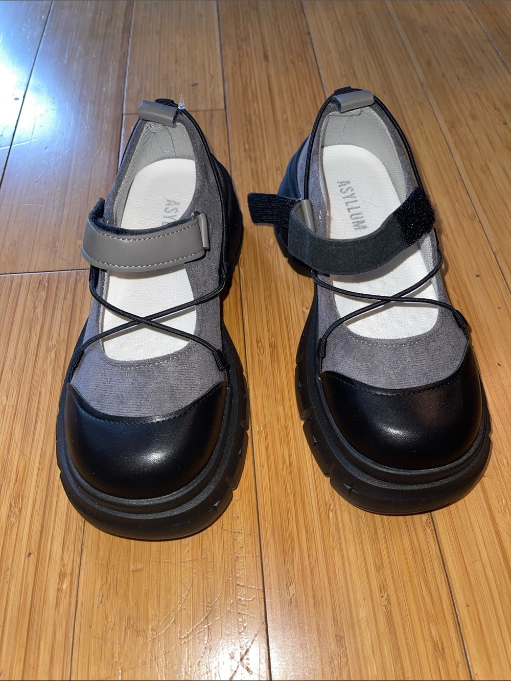 Gray and Black Mary Jane Flats with Strap. Fabric and faux leather. Very wide.
